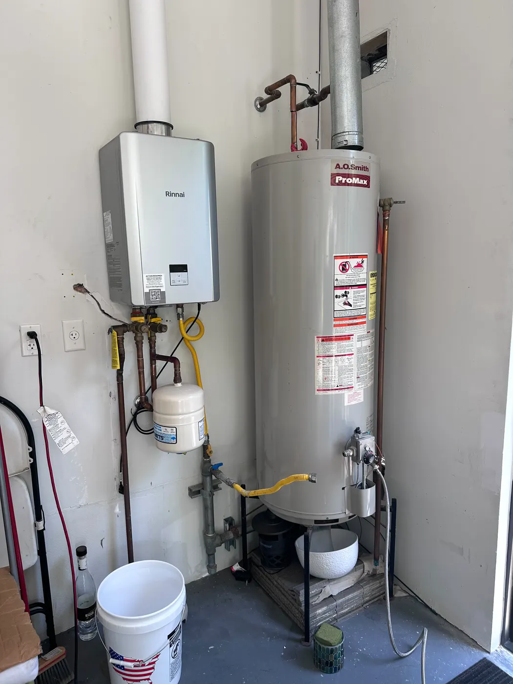 The old water heater setup before replacement